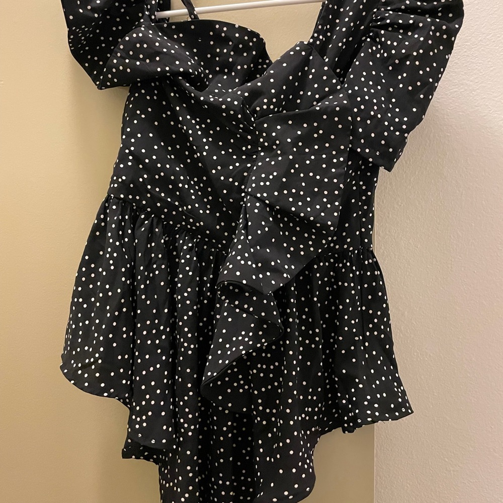 Asymmetric polka dot black top